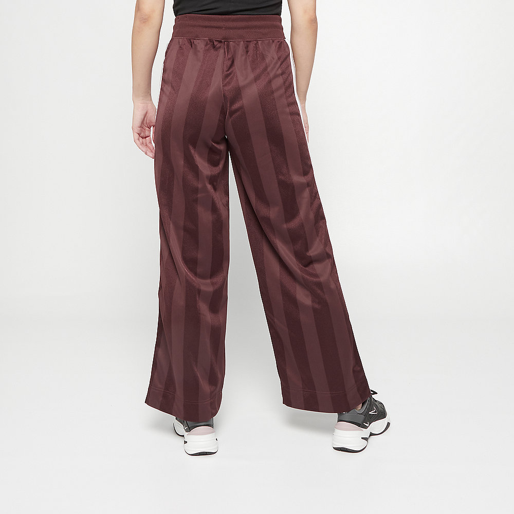 NIKE NSW Pant OH SHDW STRP el dorado/antique silver/white