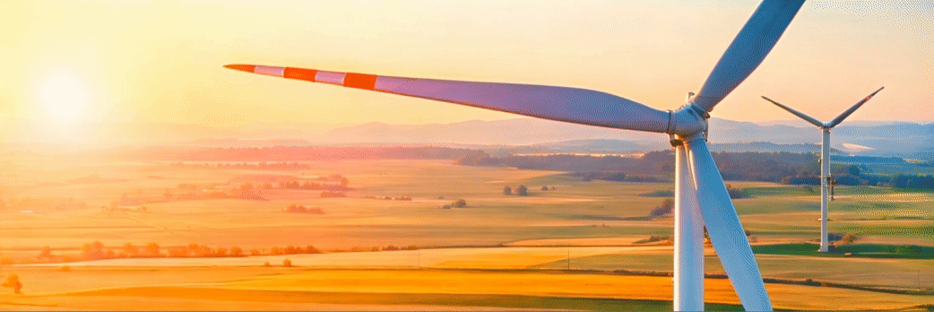 Windmills in sunset, sustainable energy sources