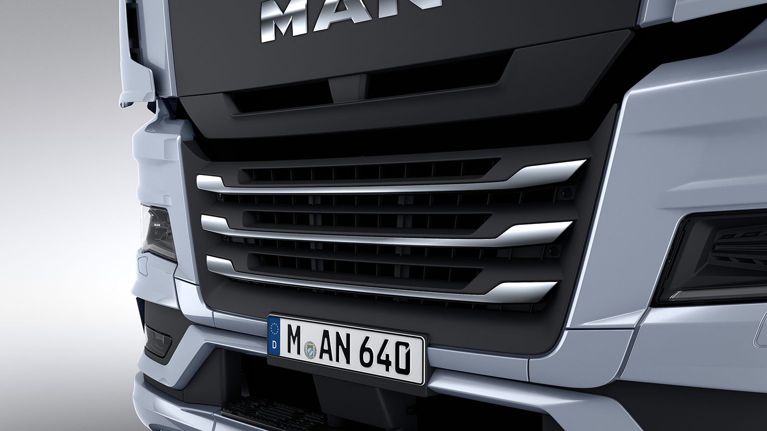 Applique chromée sur la calandre d’un camion MAN