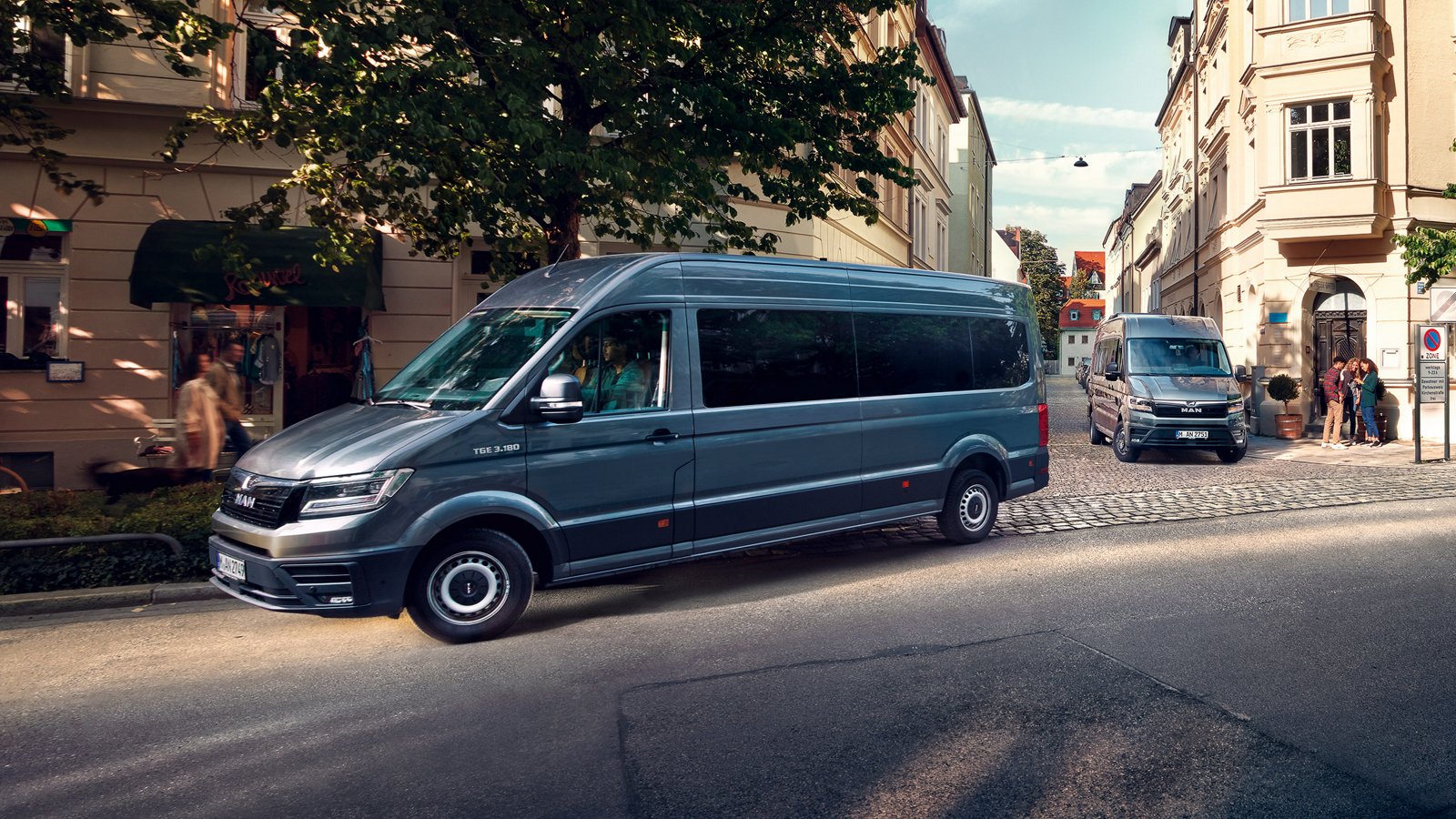 MAN TGE minibuses parked on a road