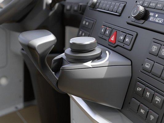 Der Busfahrer navigiert mit MAN SmartSelect im Multimediasystems durch Drehen des kleinen Drehrings
