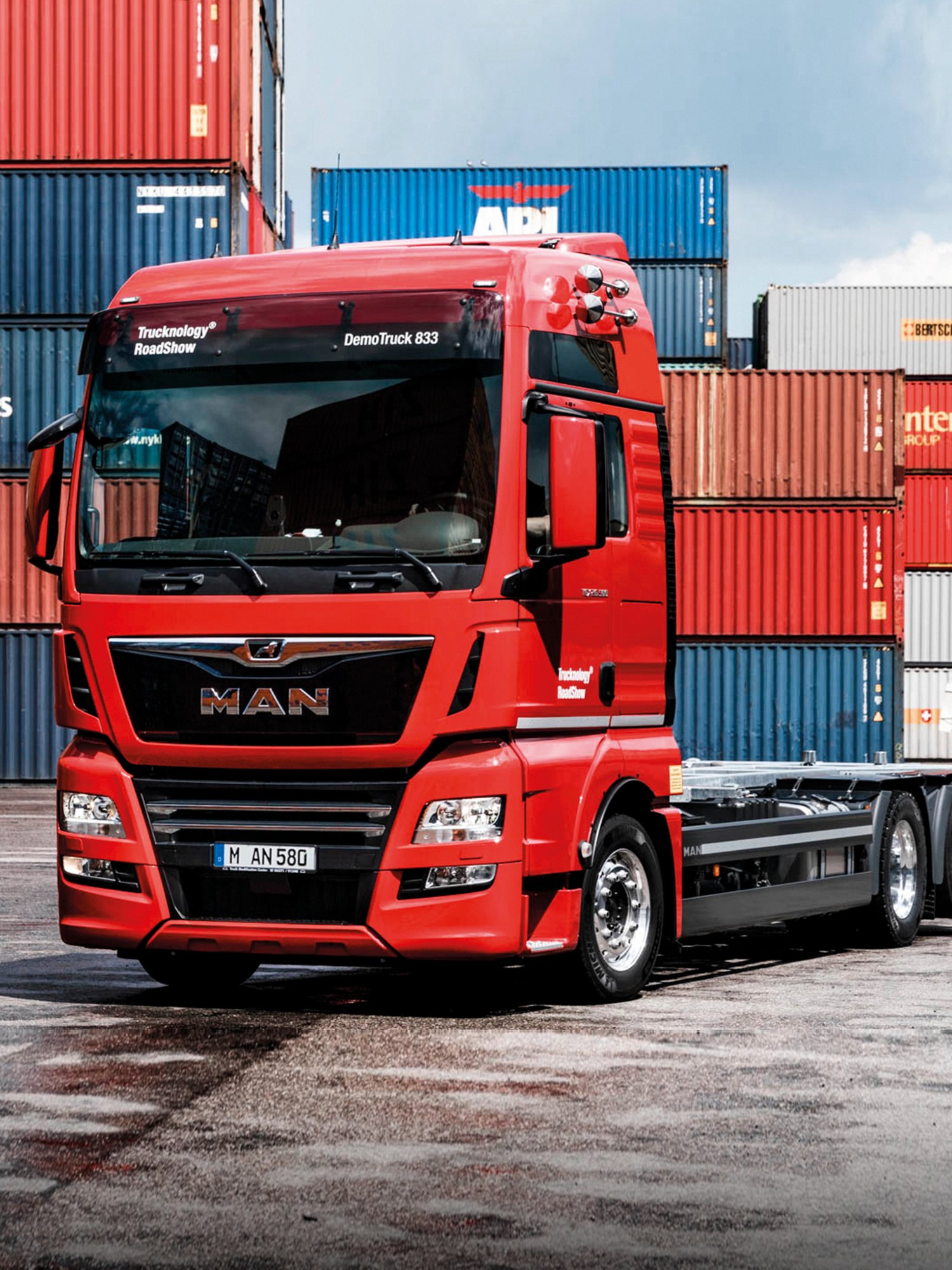 Vekselsystemer for beholdere- eller avrullingscontainere