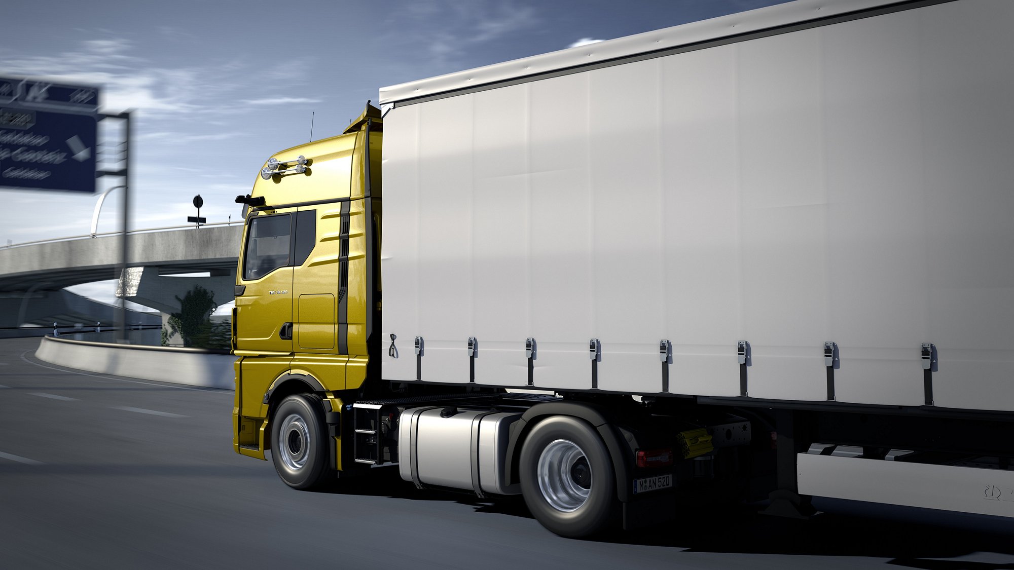 MAN TGX som kör på motorvägen, sedd från sidan.