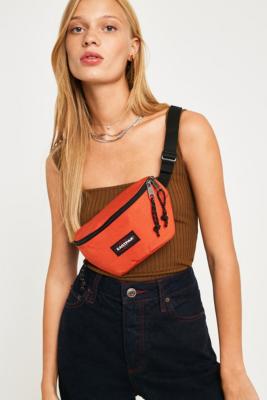 orange eastpak bum bag