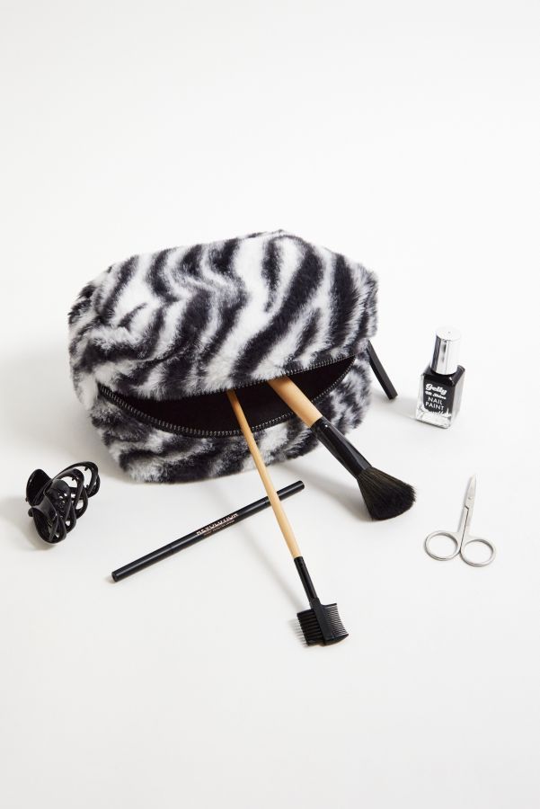 Slide View: 2: UO Zebra Print Faux Fur Makeup Bag