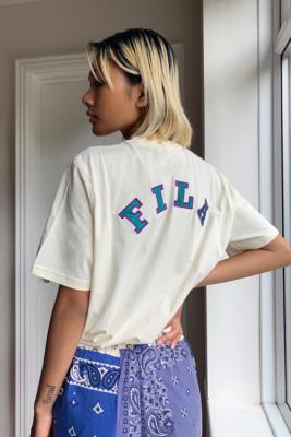 cream fila shirt