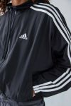 Visualizzazione miniature 1: adidas top a 3 righe con cappuccio con cappuccio intrecciato con zip