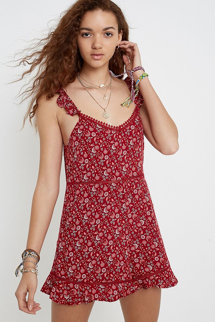 Kiss The Sky Rhapsody Red Floral Playsuit | Urban Outfitters UK