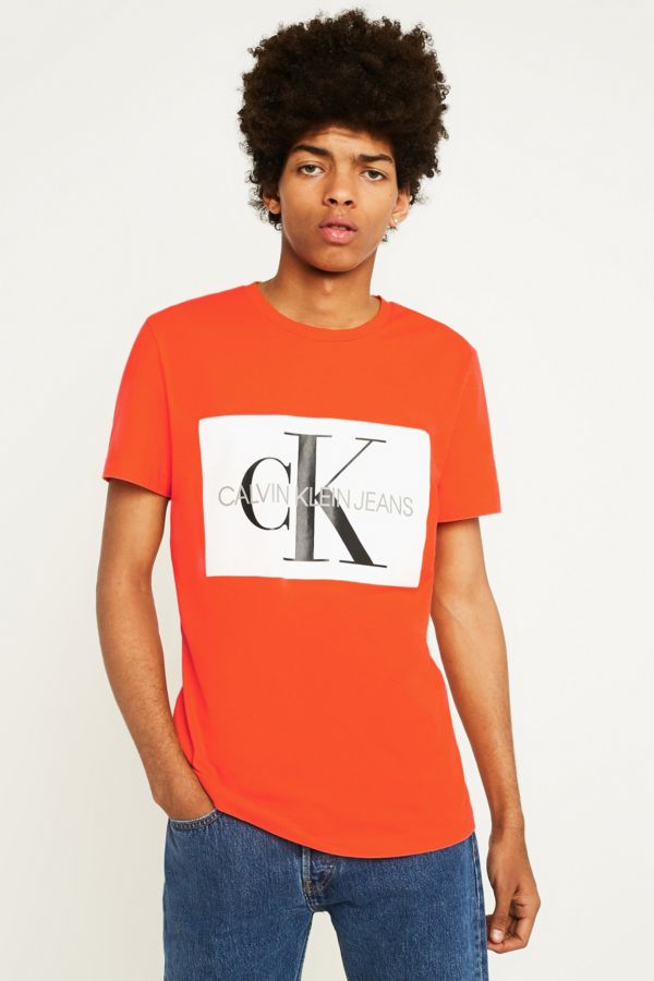 Calvin Klein Jeans Monogramed Box Logo Orange T-Shirt | Urban Outfitters UK