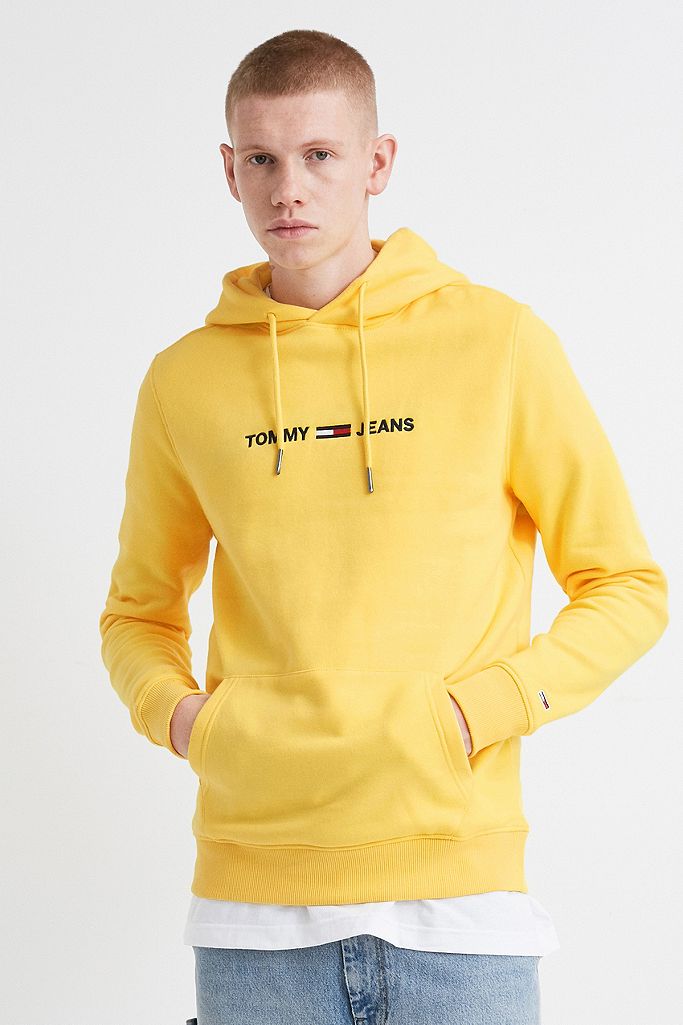 Tommy Jeans Small Logo Gold Hoodie | Urban Outfitters UK