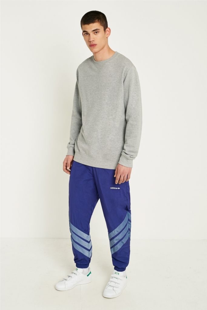 adidas Originals V-Striped Blue Track Pants | Urban Outfitters UK