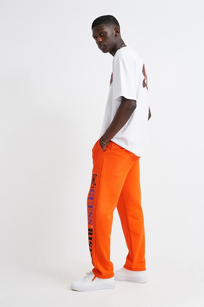 GUESS X 88rising Orange Sweatpants | Urban Outfitters UK