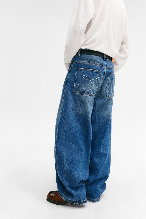 Vista diapositiva: 2: Jeans Puddle Downtown a Quadri