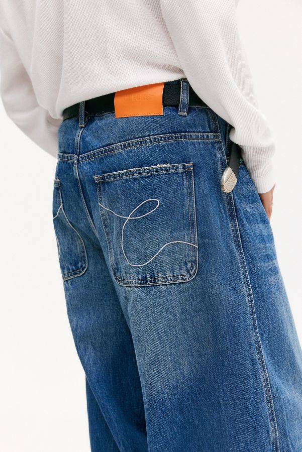 Vista diapositiva: 5: Jeans Puddle Downtown a Quadri