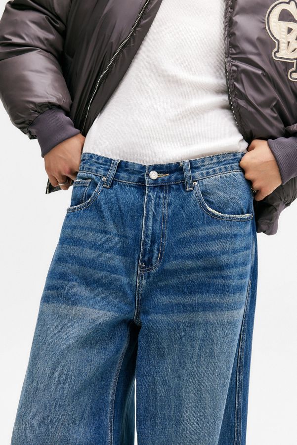 Vista diapositiva: 6: Jeans Puddle Downtown a Quadri