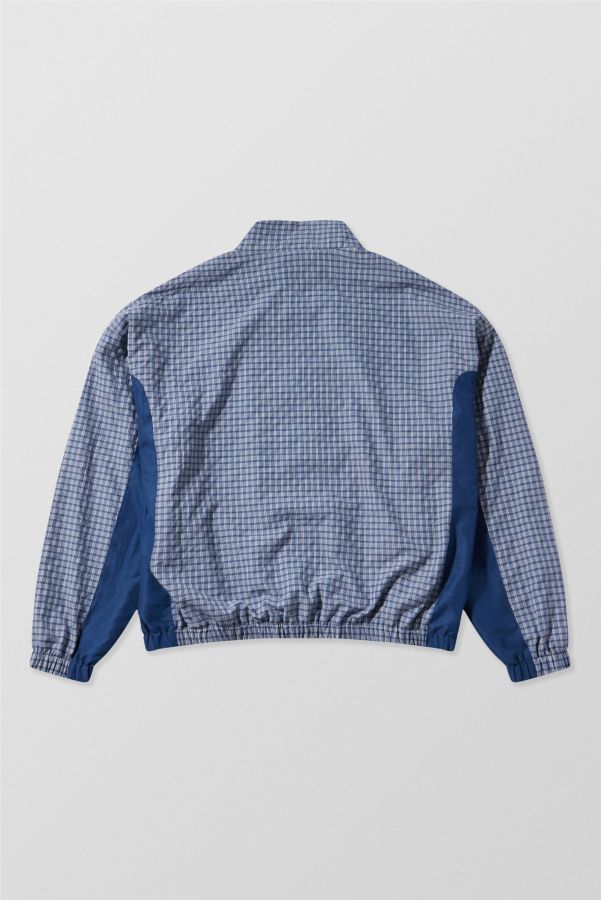 Slide View: 6: iets frans... Blue Check Panel Track Top