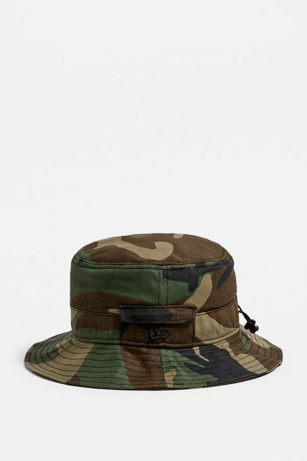 New Era Adventure Mossy Camo Dog Ear Bucket Hat Urban Outfitters UK