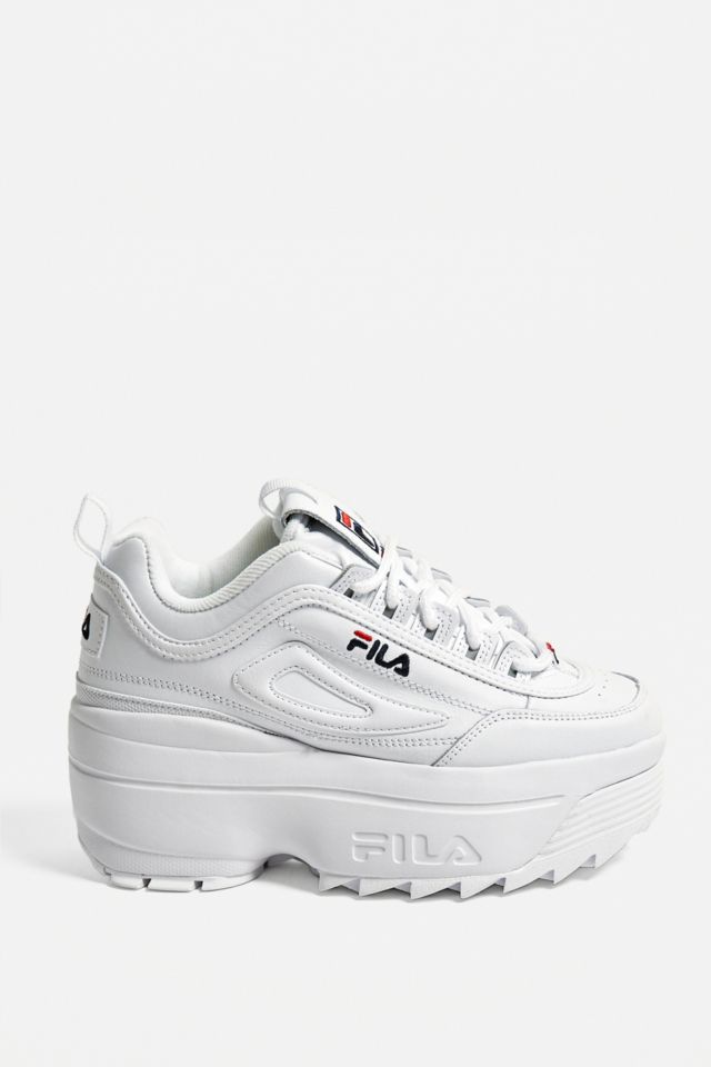 fila disruptor ii platform wedge trainers in white