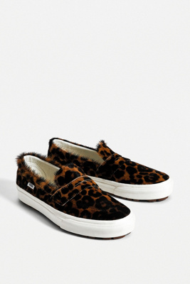 black vans with cheetah fur