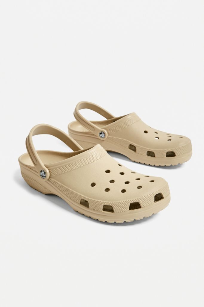 Crocs Classic Beige Clogs | Urban Outfitters UK