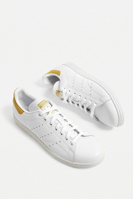 white and yellow stan smith