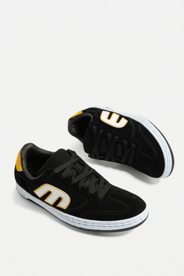 black and yellow etnies
