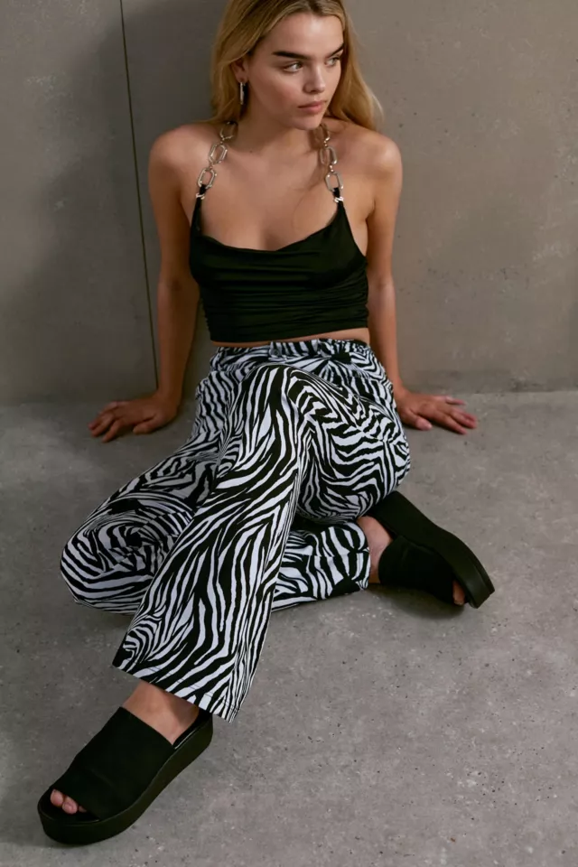 Flared trousers with zebra print