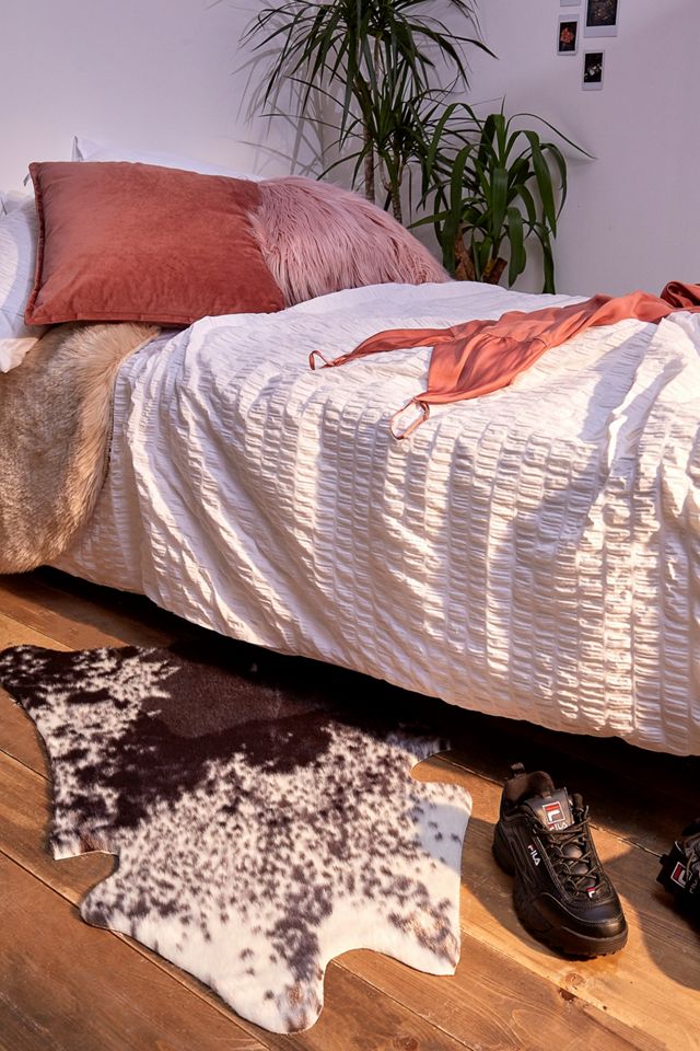 Faux Cow Skin Rug Urban Outfitters UK