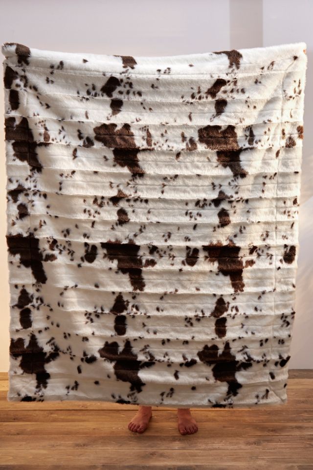 Cow Print Faux Fur Throw Blanket Urban Outfitters UK
