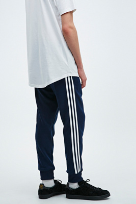 adidas cuffed tracksuit bottoms in navy