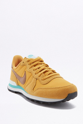 yellow nike trainers womens