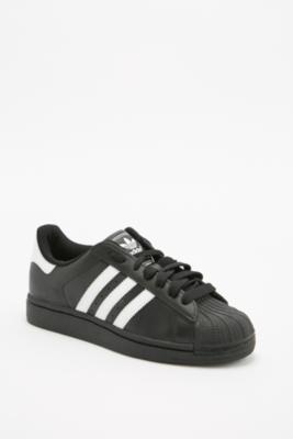 adidas white trainers with black stripes