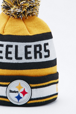 black and yellow bobble hat