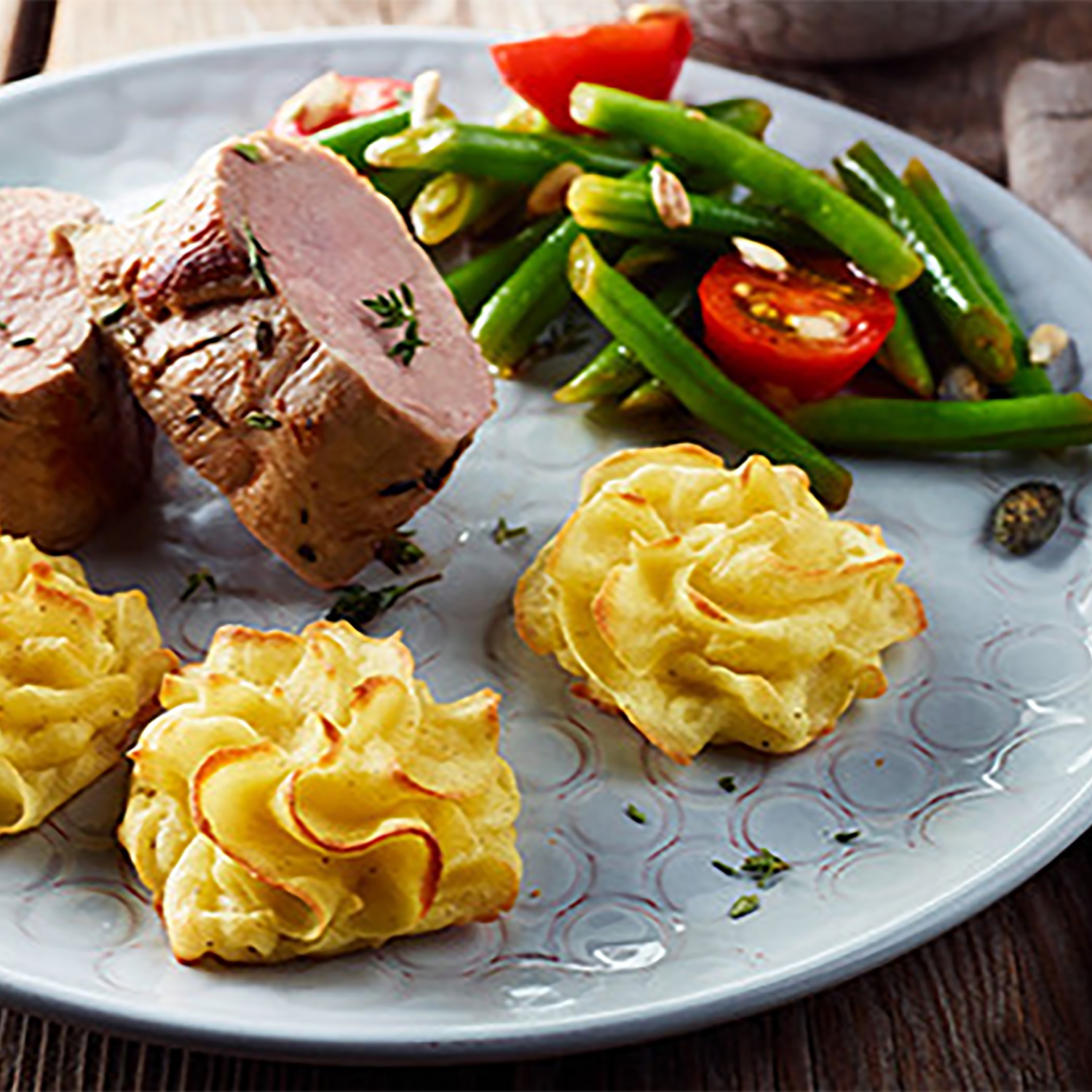 Herzogin-Kartoffeln mit Schweinefilet und Bohnensalat | ALDI Rezeptwelt