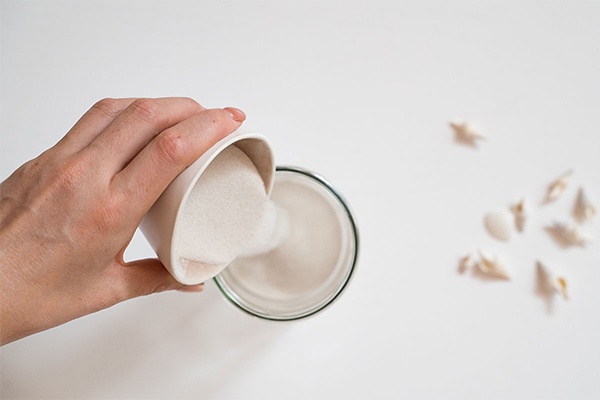 Windlichter mit Sand füllen 