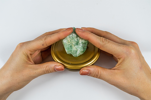 Grüner Stein auf Deckel