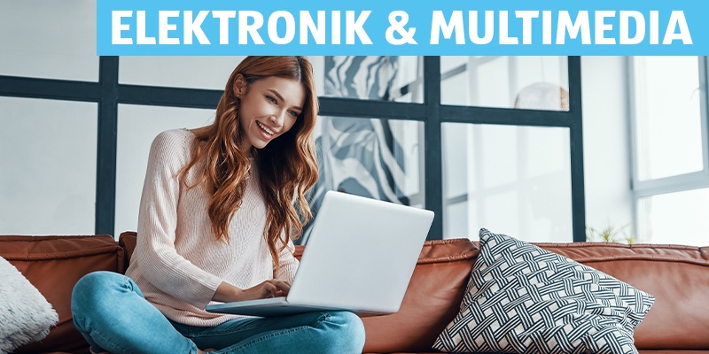 Elektronik & Multimedia: Frau mit Laptop auf einem Sofa