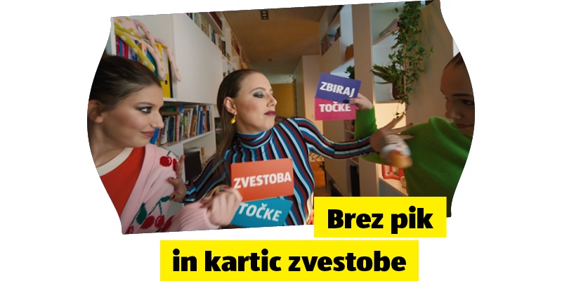 Dve dekleti na sliki plešeta in napis: Brez pik in kartic zvestobe