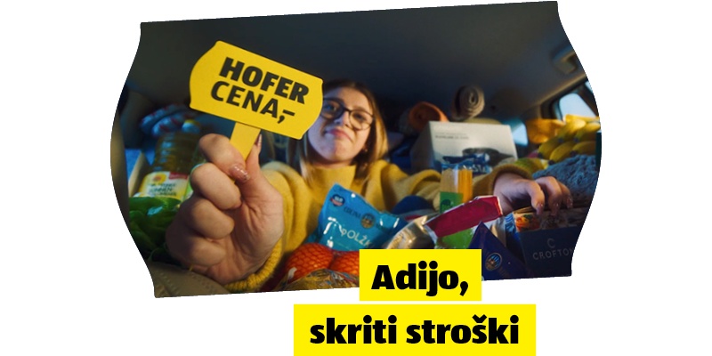 Dekle v avtu polnim dobrot  in napis: Adijo skriti stroški