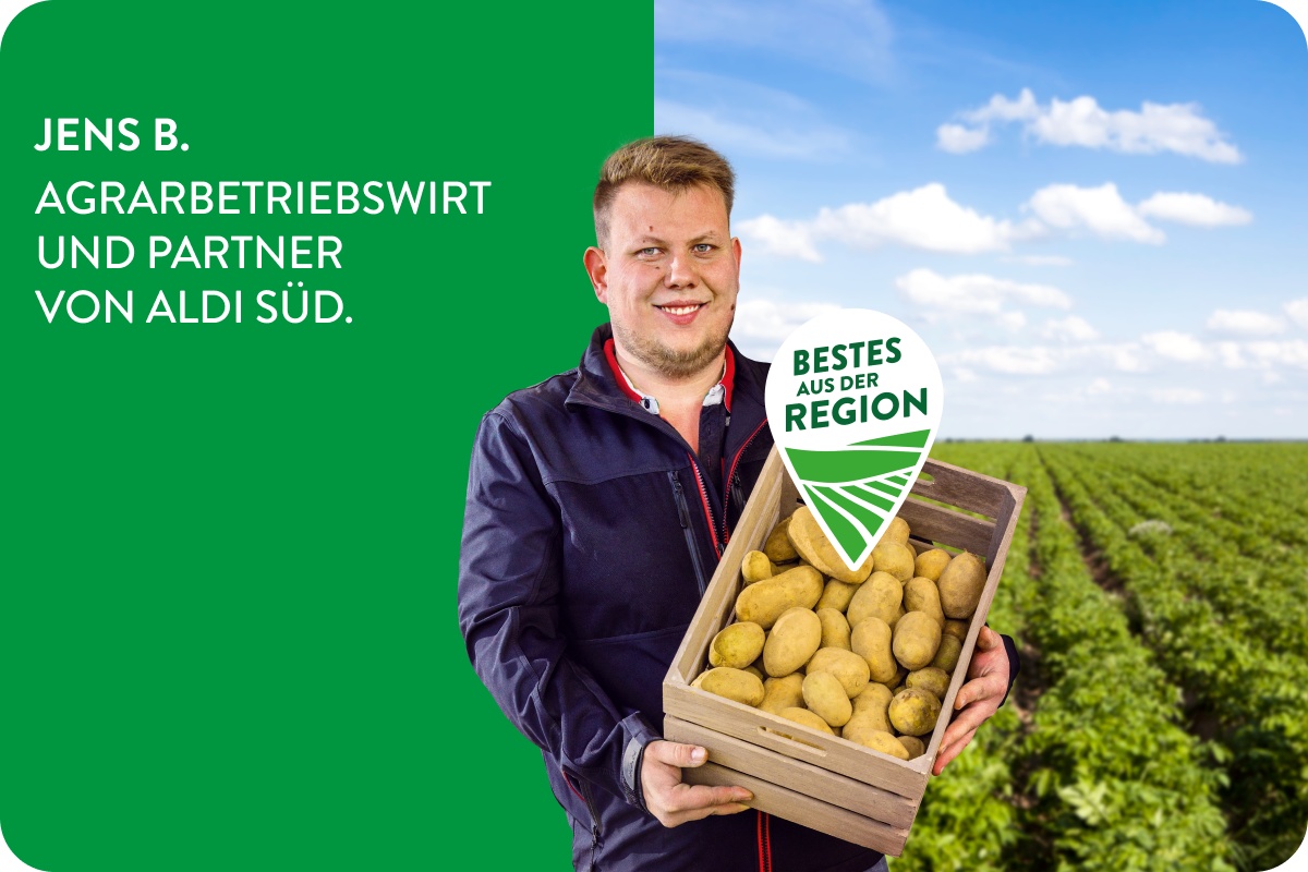 Agrarbetriebswirt mit Korb voller Kartoffeln.