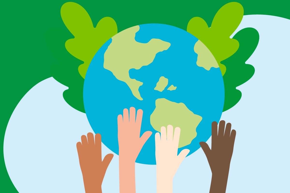 Verschiedenfarbige Hände vor der Weltkugel.