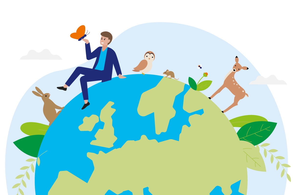 Mann sitzt mit Tieren des Waldes auf der Weltkugel .