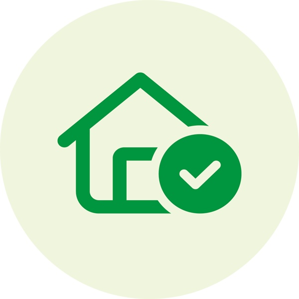 Grafik eines Hauses mit Checkmarke.