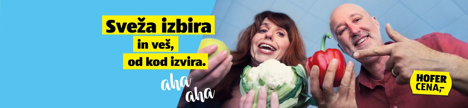 Moški in ženska kažeta na zelenjavo