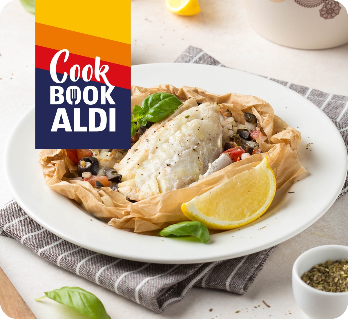 Filetti di branzino al cartoccio con patate, limone e olive