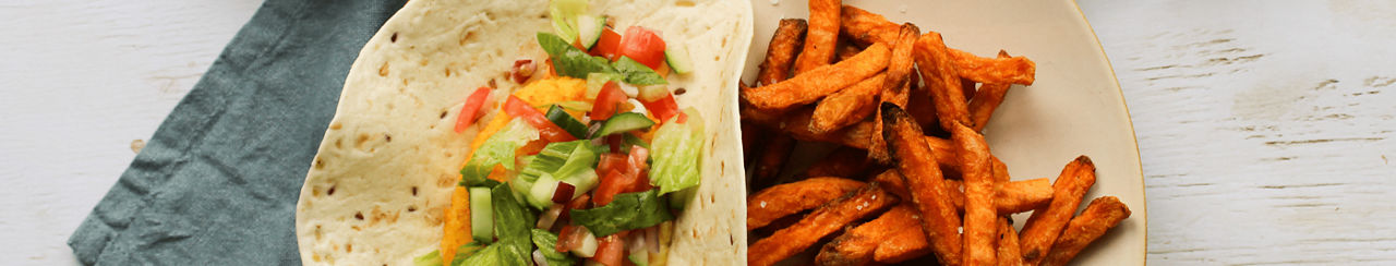 Vega wraps met zoete aardappel friet, salade & yoghurt knoflooksaus ALDI