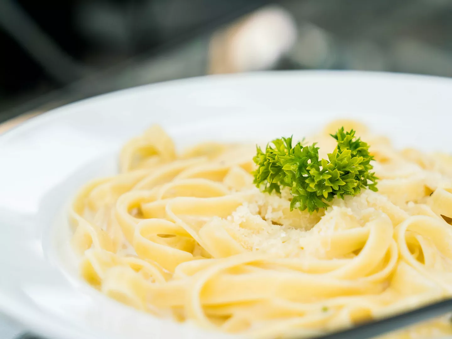Plato pasta italiana queso rallado