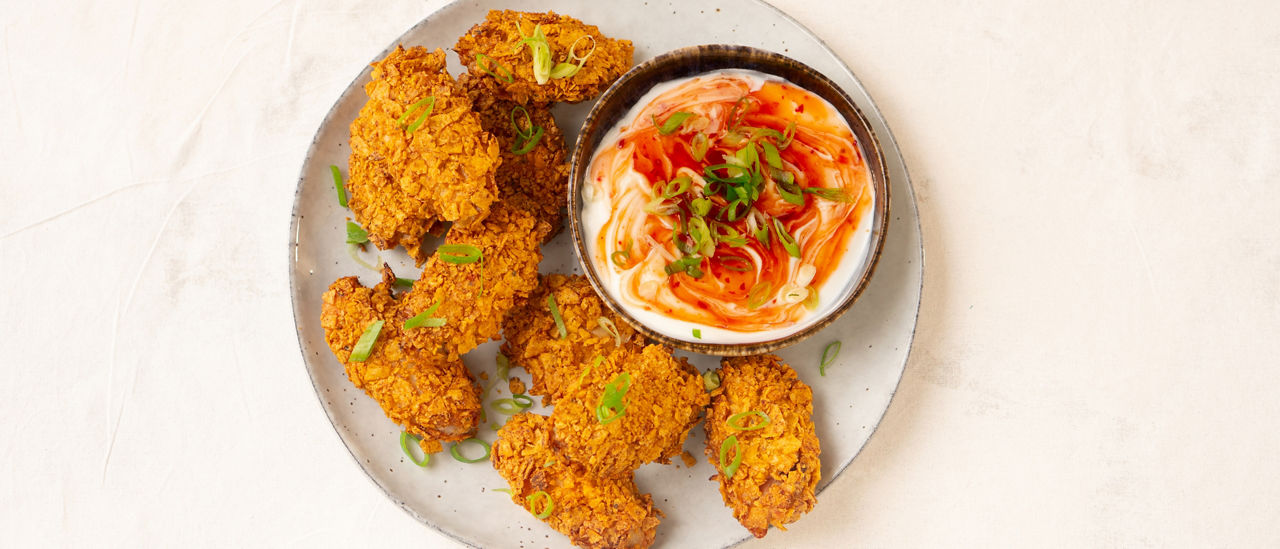 Chicken wings met een jasje van tortillachips en pittige dip ALDI Supermarkten