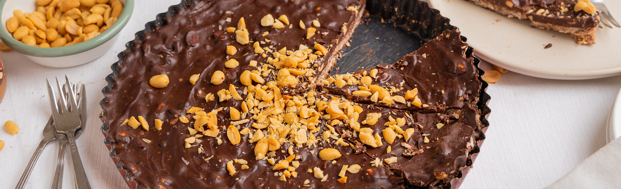Lactosevrije taart met chocolade, kokos en pindakaas 