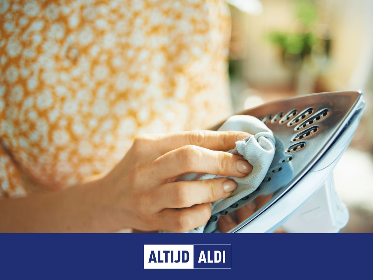 bruine aanslag strijkijzer verwijderen